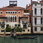 Gail Albert Halaban Out My Window Italy Italian Views Out My Window, Moving, San Marco, Venice, October, 2017 family moving with cat and fragile box in window of Venitian building gondola in canal