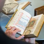 A richly illuminated medieval manuscript, Italian Book of Hours from Rome, signed and dated by the scribe, with many illuminations and decorative borders, in the hand of an art collector