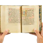 A richly illuminated medieval manuscript, Italian Book of Hours from Rome, signed and dated by the scribe, with many illuminations and decorative borders, with the page showing the holy dove