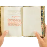 A richly illuminated medieval manuscript, Italian Book of Hours from Rome, signed and dated by the scribe, with many illuminations and decorative borders, with the page showing the signature of the scribe