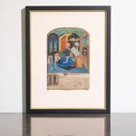 A charming illumination from a luxurious Book of Hours, depicting Saint Luke in his study with numerous books in the room, beautifully hand painted with bright and vivid colors by an anonymous master from 15th century France