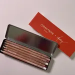 The name comes from the artist CJ Hendry and the Caran D'Ache giveaway at her London exhibition.