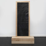 Reverse T-shaped freestanding painting with a wooden frame and base and abstract pink and faded blue crayon marks on a dark background, against a white wall Rindon Johnson Paths wind through woods. Dogs chase their tails. Smiles light up faces. Laughs echo loudly. Dreams take flight. Hopes rise high. Waves roll gently. Children skip merrily. Words convey thoughts. Maroon. Time heals wounds. Minds seek answers. Fates twist and turn. Truths reveal slowly. Lives unfold daily. Manifestation is such a chore. Say it a loud, see it how mouths: a companionable environment can engender impressive thirstiness, 2023 Ash wood, leather, crayon, oil, colored pencil, acrylic and wax 188.5 x 100 x 24.5 cm 74 1/4 x 39 3/8 x 9 5/8 inches