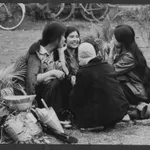 Militia girls take a break during an exercise in Hanoi.