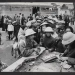 At the end of the Tet Holiday, children who had been brought back into the city for the celebration, are being re-evacuated into rural areas.