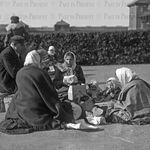 “Bread and Hope: A Family’s First Meal in America” Ellis Island NYC, c.1900s”, c.1900s