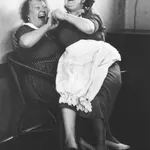 Grace Robertson, The last pub and energy to spare [woman on woman's knee], 1954