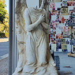 The decapitated marble angel and damage to wings