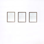 Triptych of framed white thread on paper works by Fringe Gallery artist Rebecca Messier