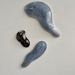 Glazed blue and black ceramic sculpture by Fringe Gallery artist Angela Okajima-Kempinas