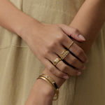 14k yellow gold, seven point emerald cut diamond ring by Fringe Gallery studio jeweler Jane Pope