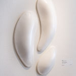 Ceramic petals that can be arranged in multiple ways by slate gray gallery artist Angela Okajima-Kempinas
