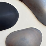Glazed gray and black organic ceramic sculpture by Fringe Gallery artist Angela Okajima-Kempinas