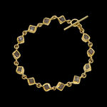 22k and 18k yellow gold bracelet with bezel set diamond crystals by Fringe Gallery studio jeweler Petra Class.