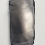 Glazed gray ceramic sculpture by Fringe Gallery artist Angela Okajima-Kempinas