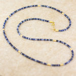 Sapphire bead necklace with 18k yellow gold tubing by Fringe Gallery studio jeweler Petra Class