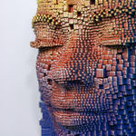 "Mask #163" a sculpture of a face made from wooden sticks and paint by slate gray gallery artist Gil Bruvel