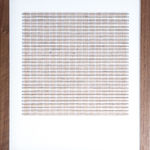 Framed tan thread on paper work by Fringe Gallery artist Rebecca Messier