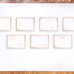 Framed white and tan thread on paper works by Fringe Gallery artist Rebecca Messier