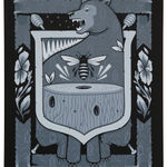 Gray-scale painting of a crest like composition depicting a growling bear, flowers, a bee with its wings stretched out flying above a log by artist Jeremy Fish.