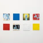 grid of small colorful pieces by Chris RWK on white gallery wall