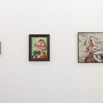 installation shot of three paintings of various size