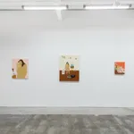installation of Gina M. Contreras exhibition - white wall with three paintings of nude female figures. From left to right: "Wrong Way Loverboy," "Gina La Cochina," and "Intimate Layers."