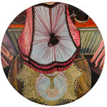 Circular painting of a distorted lamp on a wooden table from an aerial view
