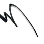 Close up of Black scribble abstract work from Arnaud Vidricaire in the shape of an imperfect circle with a scribble going through the middle made of laser cut burnt wood