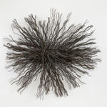 Artwork composed of a circular starburst shaped bundle of wire rope