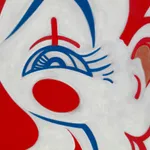 Close up of Red and blue graphic clown face against white background