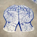 Slavs and Tatars woven floor sculpture of hands