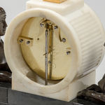 Patinated and Gilt Bronze Mounted Marble Mantel Timepiece