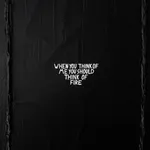 A close-up detail of the artwork "When you think of me you should think of fire," highlighting the high-contrast white lettering and the raw, tactile ridges of the joint compound.