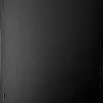 A wide-angle shot of the artwork "Nothing for everything," showing how ambient lighting interacts with the heavily textured surface of joint compound and acrylic.