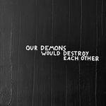 A high-contrast close-up of the central text, showcasing the expressive, weathered white lettering and the physical depth of the underlying textured layers.