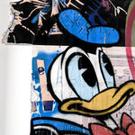 lhouette artist using collage acrylic diamond dust featuring Disney characters like Donald duck with orange blue white red brown colours