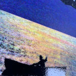 Joe webb british collage print artist creating space scenes in blue black glitter green sun