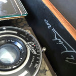 Vintage storybox with photographs of man playing guitar
