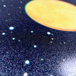 Joe webb british collage print artist creating space scenes in blue black glitter green sun