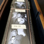 Vintage storybox with photographs of man playing guitar