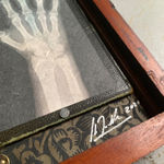 Vintage wooden story box, photographed x-ray hand