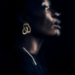 sculptural earrings by Ute Decker, jewellery artist exhibiting at Goldsmiths' Fair 2022