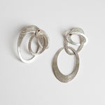 sculptural earrings by Ute Decker, jewellery artist exhibiting at Goldsmiths' Fair 2022