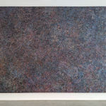 Detail of large acrylic and mixed media on canvas in an abstract expressionist mode of thousands of multicolored small rings creating a sense of cosmic depth