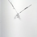 Graphite on paper of two dark lines in central form.