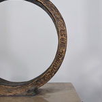 Detail Modernist bronze sculpture of stylized owl represented by vertical bar, one eye open, one closed, on circular perch