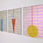 Three minimalist paintings comprised of geometric abstract forms in front of a background of iridescent pastel hues