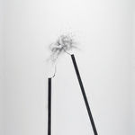 Graphite on paper drawing of two straight bold lines with a bust at their point.