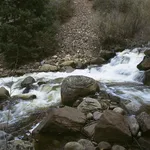 Andy Goldsworthy, River boulder redrawn with water, Woody Creek, Colorado, August 2006, 2006